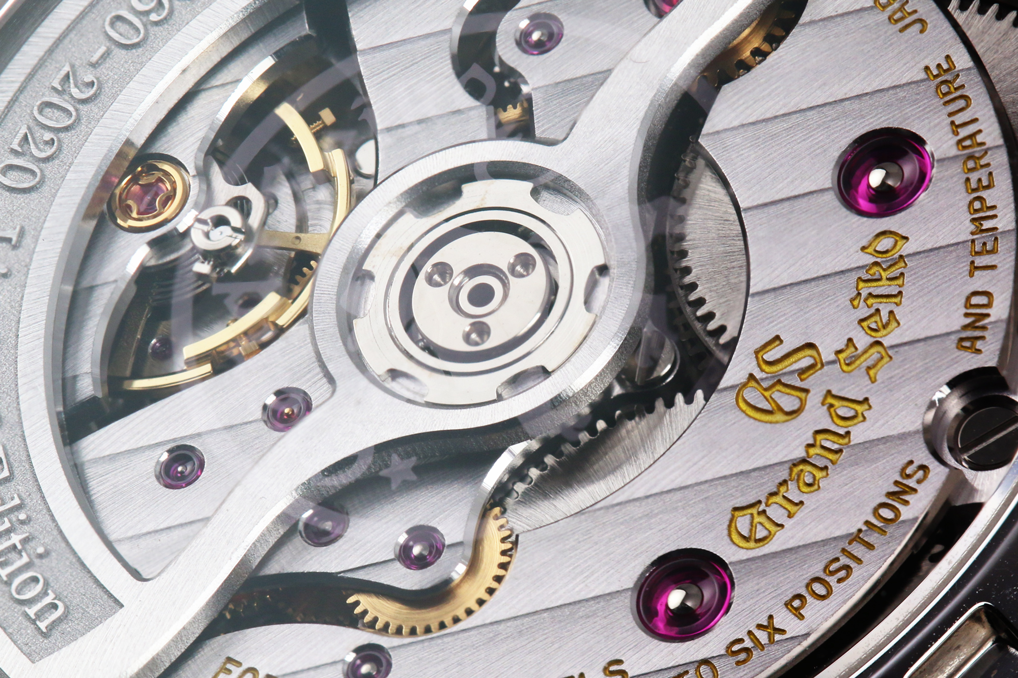 Caliber 9SA5 through a sapphire case back.