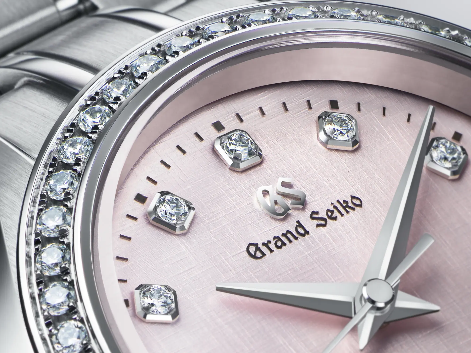 Grand Seiko STGK019 ladies watch with pink dial.