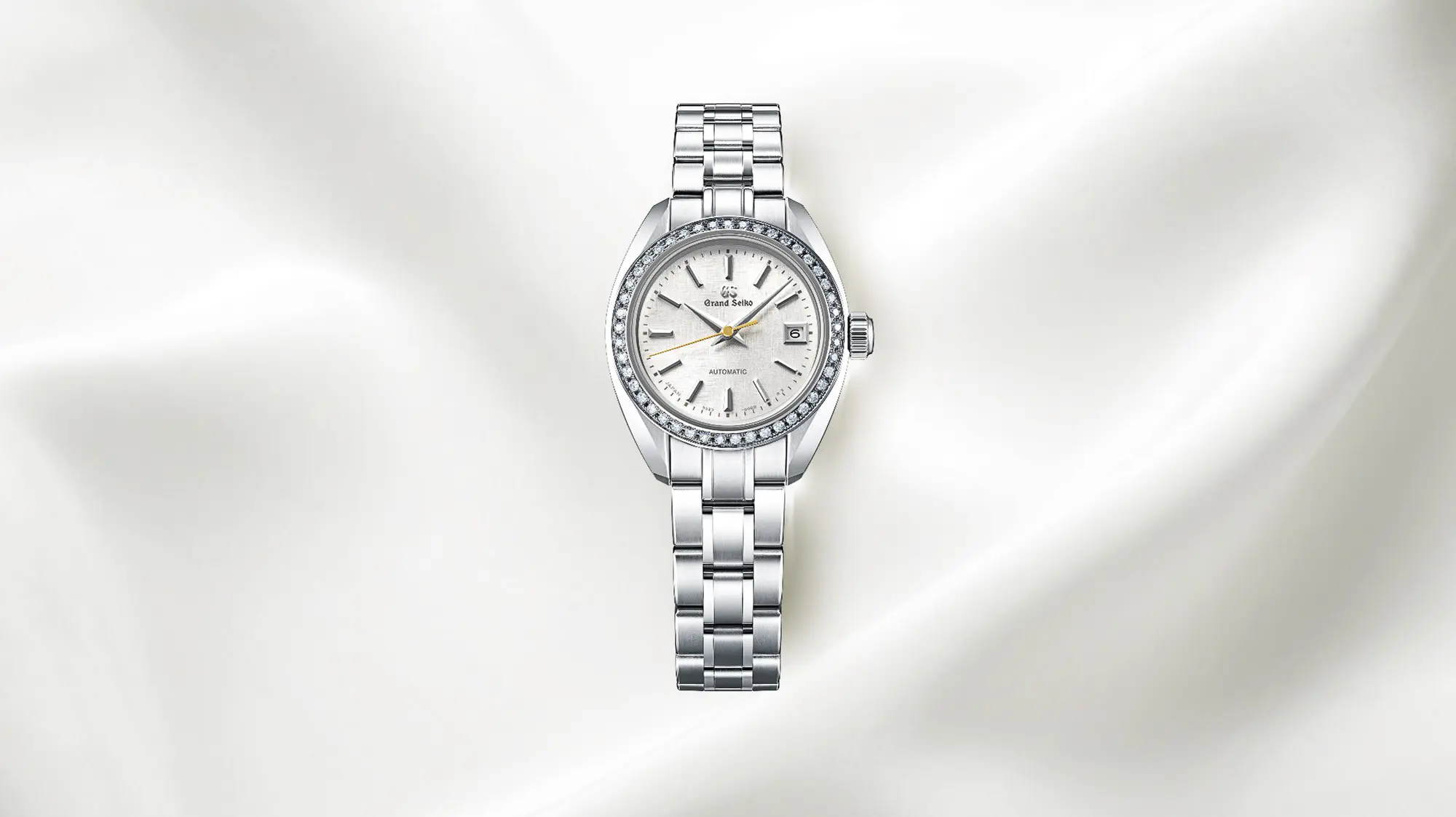 Grand Seiko STGK021 ladies watch with white dial.